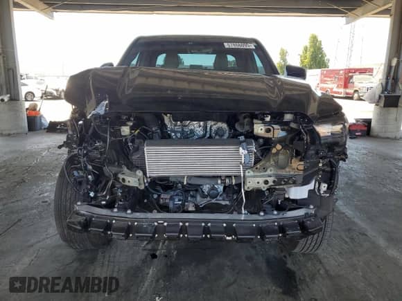 2024 Toyota Tacoma SR5 with VIN 3TMKB5FN9RM023449, listed as a Copart auction lot 67866095 with 5,550 mi miles and Salvage title. Bid and sale history available at DreamBid. Image 5.
