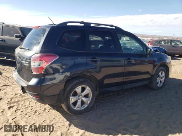 2014 Subaru Forester Premium with VIN JF2SJACC0EG452578, listed as a Copart auction lot 87355824 with 80,600 mi miles and Salvage title. Bid and sale history available at DreamBid. Image 3.