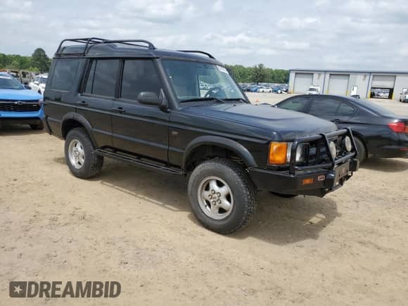2000 Land Rover Discovery с VIN SALTL1243YA280327, выставлен на аукционе Copart как лот 53193785 с пробегом 115 309 миль миль и Списание • Salvage title. История ставок и продаж доступна на DreamBid. Изображение 4.