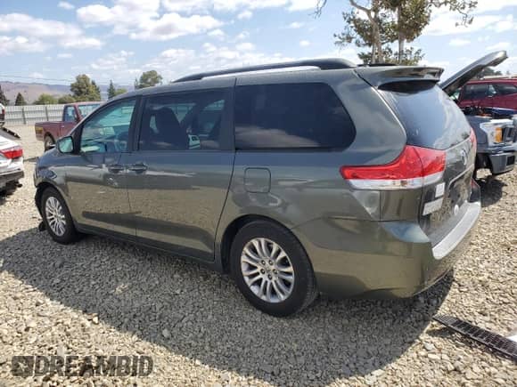 2011 Toyota Sienna XLE AAS с VIN 5TDYK3DC1BS019109, выставлен на аукционе Copart как лот 71665815 с пробегом 233 449 миль миль и Списание • Salvage title. История ставок и продаж доступна на DreamBid. Изображение 2.