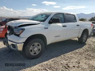 2012 Toyota Tundra с VIN 5TFDY5F10CX218930, выставлен на аукционе Copart как лот 70060405 с пробегом 250 953 миль миль и Списание • Salvage title. История ставок и продаж доступна на DreamBid. Изображение 1.