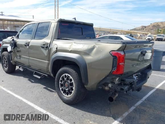 2024 Toyota Tacoma SR5 with VIN 3TMLB5JN6RM027745, listed as a IAAI auction lot 41479793 with 16,376 mi miles and . Bid and sale history available at DreamBid. Image 3.