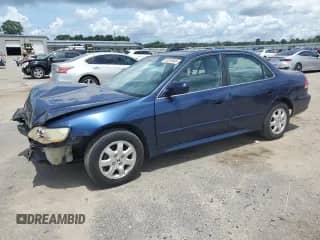 2002 Honda Accord EX with VIN 1HGCG56612A065326, listed as a Copart auction lot 60815895 with 176,251 mi miles and Salvage title. Bid and sale history available at DreamBid. Image 1.