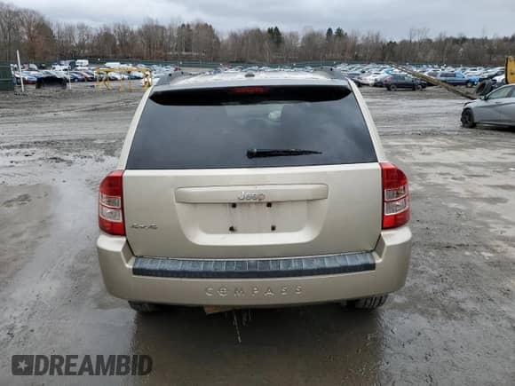 2010 Jeep Compass Latitude с VIN 1J4NF1FB5AD623461, выставлен на аукционе Copart как лот 49132315 с пробегом 113 496 миль миль и Списание • Salvage title. История ставок и продаж доступна на DreamBid. Изображение 6.