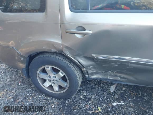 2009 Honda Pilot Touring with VIN 5FNYF48979B007005, listed as a IAAI auction lot 43454497 with 128,268 mi miles and . Bid and sale history available at DreamBid. Image 6.