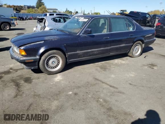 1994 BMW 7 Series with VIN WBAGD8322RDE92891, listed as a Copart auction lot 82638705 with 194,269 mi miles and Clean title. Bid and sale history available at DreamBid. Image 1.