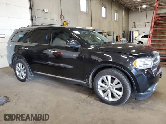 2013 Dodge Durango Crew with VIN 1C4RDJDG8DC643760, listed as a Copart auction lot 80074455 with 138,563 mi miles and Salvage title. Bid and sale history available at DreamBid. Image 4.