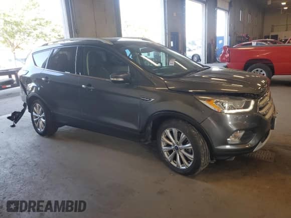 2017 Ford Escape Titanium с VIN 1FMCU9J92HUD53813, выставлен на аукционе Copart как лот 81221285 с пробегом 46 881 миль миль и Списание • Salvage title. История ставок и продаж доступна на DreamBid. Изображение 4.