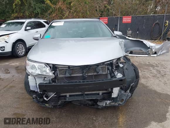 2013 Toyota Camry LE z VIN 4T1BD1FK2DU069763, wystawiony jako IAAI lot #43414989 z przebiegiem 70 738 mil mil oraz . Historia ofert i sprzedaży dostępna na DreamBid. Obrazek 12.