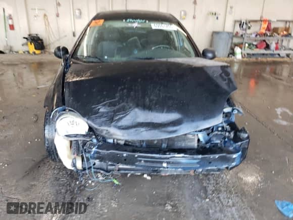 2002 Dodge Neon ES with VIN 1B3ES56C52D625182, listed as a Copart auction lot 69001705 with 234,323 mi miles and Salvage title. Bid and sale history available at DreamBid. Image 5.