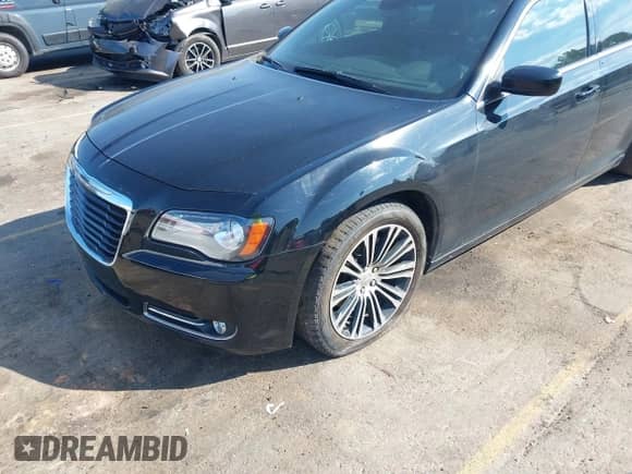 2014 Chrysler 300 S with VIN 2C3CCABT7EH180960, listed as a IAAI auction lot 38901474 with 141,716 mi miles and . Bid and sale history available at DreamBid. Image 6.
