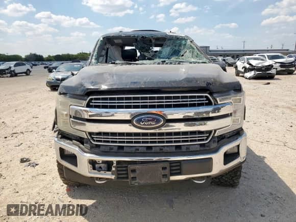 2018 Ford F-150 Lariat z VIN 1FTEW1E50JFB80304, wystawiony jako Copart lot #81345365 z przebiegiem Nie podano mil oraz Szkoda całkowita • Salvage title. Historia ofert i sprzedaży dostępna na DreamBid. Obrazek 5.