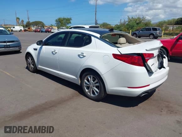 2013 KIA OPTIMA with VIN SXXGN4A75DG170636, listed as a IAAI auction lot 43096697 with 83,396 mi miles and . Bid and sale history available at DreamBid. Image 3.