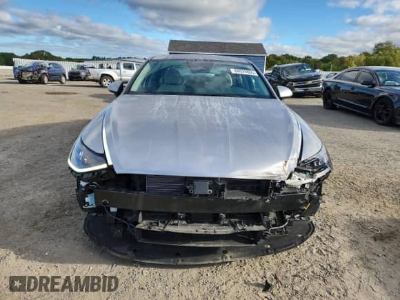 2021 Hyundai Sonata Blue с VIN KMHL24JJ6MA030492, выставлен на аукционе Copart как лот 84024805 с пробегом 27 940 миль миль и Списание • Salvage title. История ставок и продаж доступна на DreamBid. Изображение 5.