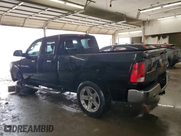 2012 Ram 1500 Big Horn с VIN 1C6RD7GT0CS284122, выставлен на аукционе Copart как лот 81627135 с пробегом 142 287 миль миль и Списание • Salvage title. История ставок и продаж доступна на DreamBid. Изображение 2.