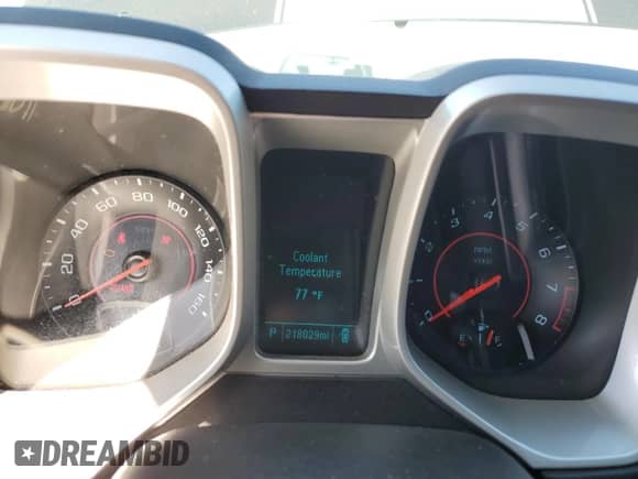 2014 Chevrolet Camaro LS z VIN 2G1FA1E36E9301121, wystawiony jako Copart lot #82420755 z przebiegiem 218 029 mil mil oraz Szkoda całkowita • Salvage title. Historia ofert i sprzedaży dostępna na DreamBid. Obrazek 9.