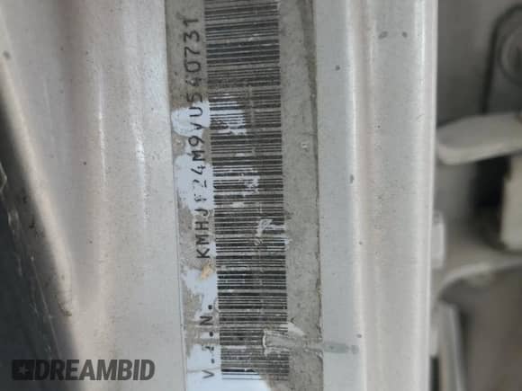 1997 Hyundai Elantra z VIN KMHJF24M9VU540731, wystawiony jako Copart lot #63684645 z przebiegiem Nie podano mil oraz Szkoda całkowita • Salvage title. Historia ofert i sprzedaży dostępna na DreamBid. Obrazek 12.