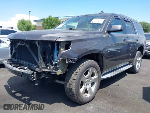 2015 Chevrolet Tahoe LS z VIN 1GNSCAKC0FR742276, wystawiony jako IAAI lot #43052060 z przebiegiem 58 077 mil mil oraz . Historia ofert i sprzedaży dostępna na DreamBid. Obrazek 20.