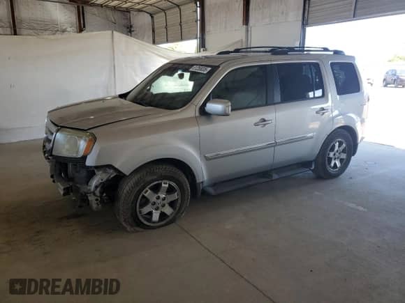 2009 Honda Pilot Touring с VIN 5FNYF48929B002908, выставлен на аукционе Copart как лот 81255035 с пробегом Не указан миль и Списание • Salvage title. История ставок и продаж доступна на DreamBid. Изображение 1.