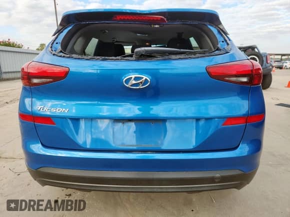 2019 Hyundai Tucson SE with VIN KM8J23A4XKU956627, listed as a Copart auction lot 81857805 with 91,486 mi miles and Salvage title. Bid and sale history available at DreamBid. Image 6.