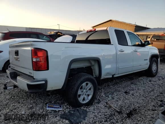 2018 GMC Sierra 1500 z VIN 1GTR1LEC3JZ341513, wystawiony jako Copart lot #77564244 z przebiegiem 56 873 mil mil oraz Szkoda całkowita • Salvage title. Historia ofert i sprzedaży dostępna na DreamBid. Obrazek 3.