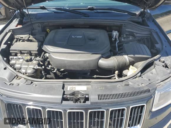 2016 Jeep Grand Cherokee 75th Anniversary with VIN 1C4RJFAGXGC379472, listed as a Copart auction lot 65560445 with 154,396 mi miles and Salvage title. Bid and sale history available at DreamBid. Image 12.