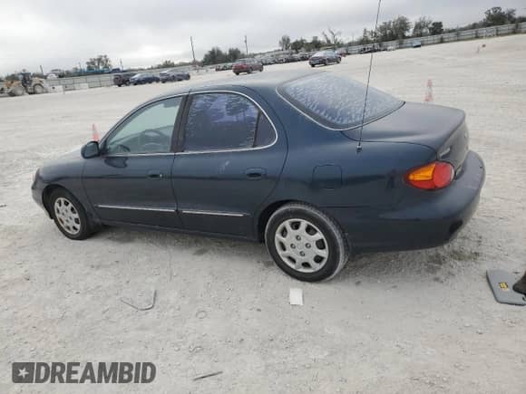 2000 Hyundai Elantra GLS z VIN KMHJF35F9YU032902, wystawiony jako Copart lot #45145955 z przebiegiem 79 229 mil mil oraz Czysty tytuł • Clean title. Historia ofert i sprzedaży dostępna na DreamBid. Obrazek 2.