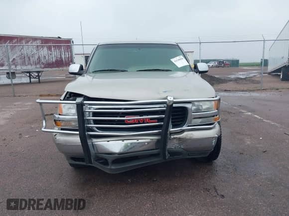 2002 GMC Sierra 1500 SLE z VIN 2GTEK19TX21147176, wystawiony jako IAAI lot #42548008 z przebiegiem 308 911 mil mil oraz . Historia ofert i sprzedaży dostępna na DreamBid. Obrazek 13.