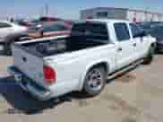 2004 Dodge Dakota SLT with VIN 1D7HL48K34S758499, listed as a IAAI auction lot 42035062 with 145,305 mi miles and . Bid and sale history available at DreamBid. Image 4.