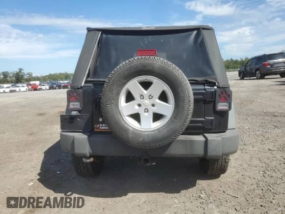 2010 Jeep Wrangler Sport с VIN 1J4AA2D13AL111104, выставлен на аукционе Copart как лот 84287605 с пробегом 110 407 миль миль и Списание • Salvage title. История ставок и продаж доступна на DreamBid. Изображение 6.