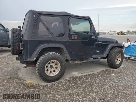2001 Jeep Wrangler SE with VIN 1J4FA29P41P328835, listed as a Copart auction lot 68713745 with 274,578 mi miles and Clean title. Bid and sale history available at DreamBid. Image 3.