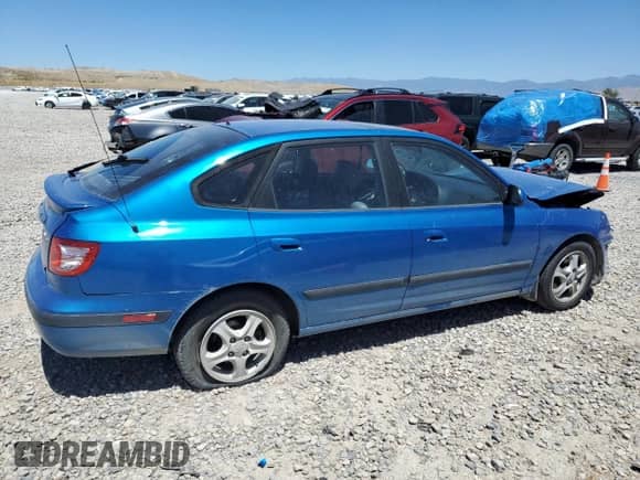 2004 Hyundai Elantra GT z VIN KMHDN56D24U104882, wystawiony jako Copart lot #64136915 z przebiegiem 135 495 mil mil oraz Szkoda całkowita • Salvage title. Historia ofert i sprzedaży dostępna na DreamBid. Obrazek 3.