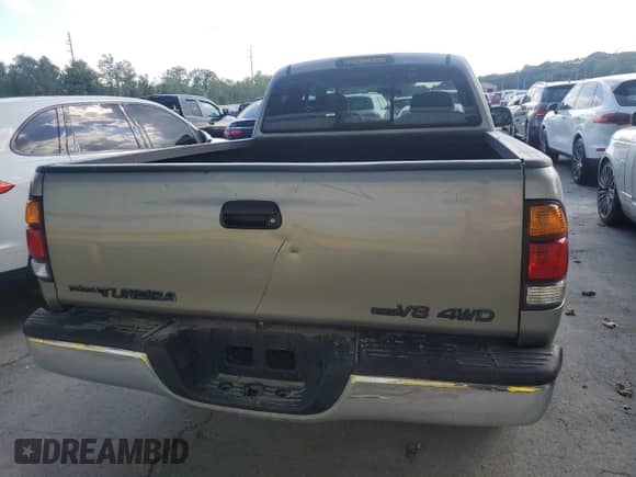 2004 Toyota Tundra SR5 z VIN 5TBBT44184S439680, wystawiony jako Copart lot #69971965 z przebiegiem 219 367 mil mil oraz Czysty tytuł • Clean title. Historia ofert i sprzedaży dostępna na DreamBid. Obrazek 6.