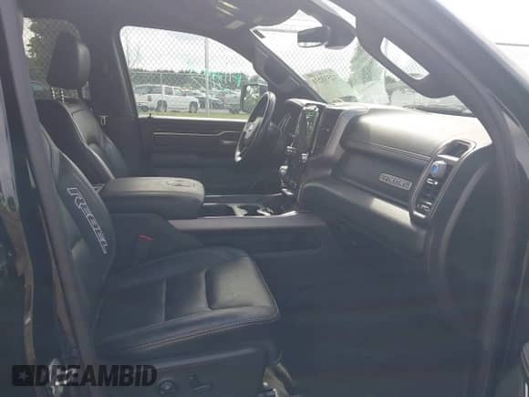 2020 Ram 1500 Rebel with VIN 1C6SRFLT9LN368781, listed as a IAAI auction lot 42533231 with 76,405 mi miles and . Bid and sale history available at DreamBid. Image 5.