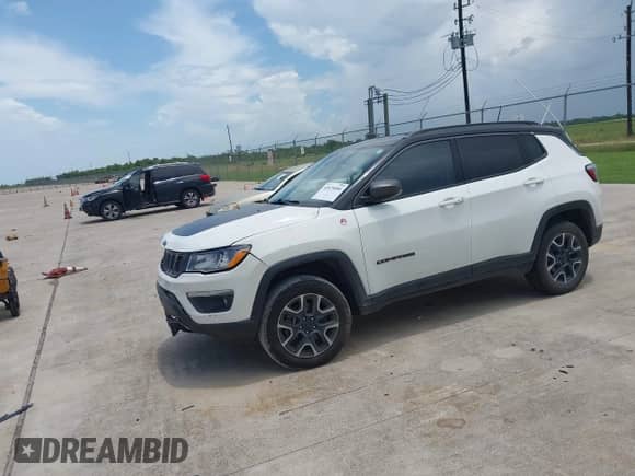 2021 Jeep Compass Trailhawk z VIN 3C4NJDDB3MT520448, wystawiony jako IAAI lot #42675404 z przebiegiem 84 376 mil mil oraz . Historia ofert i sprzedaży dostępna na DreamBid. Obrazek 17.
