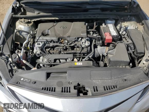 2021 Toyota Camry LE z VIN 4T1R11AK8MU455540, wystawiony jako Copart lot #82185805 z przebiegiem 16 292 mil mil oraz Szkoda całkowita • Salvage title. Historia ofert i sprzedaży dostępna na DreamBid. Obrazek 11.