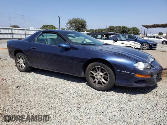 2000 Chevrolet Camaro z VIN 2G1FP22K0Y2172094, wystawiony jako Copart lot #68943135 z przebiegiem 157 026 mil mil oraz Czysty tytuł • Clean title. Historia ofert i sprzedaży dostępna na DreamBid. Obrazek 4.