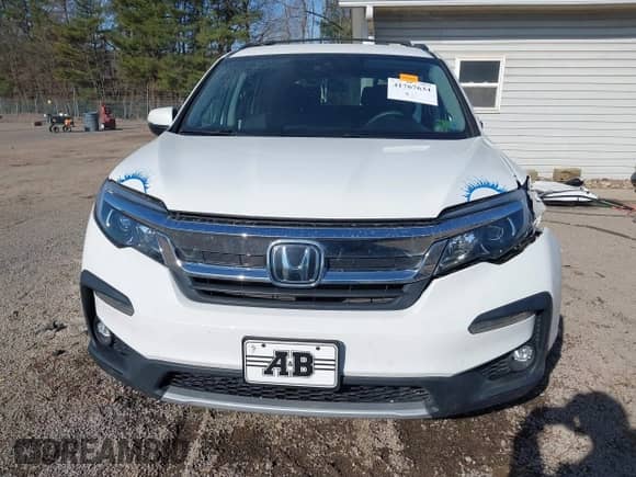 2021 Honda Pilot EX with VIN 5FNYF6H31MB010966, listed as a IAAI auction lot 41767634 with 53,303 mi miles and . Bid and sale history available at DreamBid. Image 13.