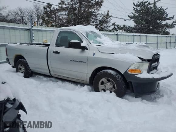 2012 Ram 1500 ST z VIN 3C6JD6DP2CG207886, wystawiony jako Copart lot #41557525 z przebiegiem 246 807 mil mil oraz Szkoda całkowita • Salvage title. Historia ofert i sprzedaży dostępna na DreamBid. Obrazek 4.
