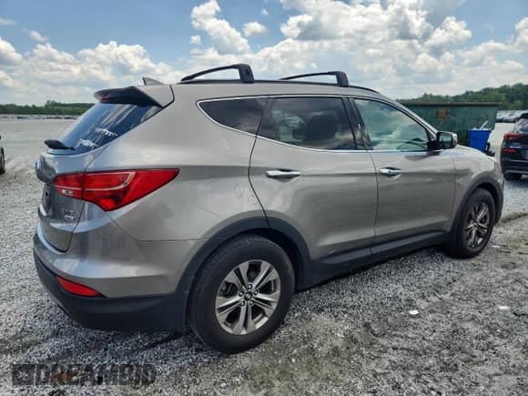 2015 Hyundai Santa Fe z VIN 5XYZUDLB1FG294690, wystawiony jako Copart lot #65039015 z przebiegiem 144 835 mil mil oraz Szkoda całkowita • Salvage title. Historia ofert i sprzedaży dostępna na DreamBid. Obrazek 3.