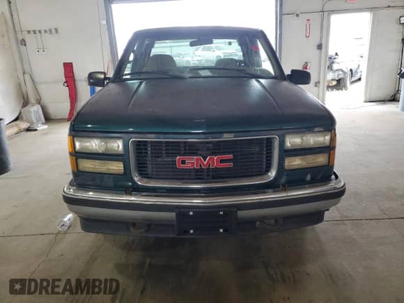 1995 GMC Sierra 1500 z VIN 2GTEC19K2S1558740, wystawiony jako Copart lot #69398185 z przebiegiem 386 899 mil mil oraz Szkoda całkowita • Salvage title. Historia ofert i sprzedaży dostępna na DreamBid. Obrazek 5.