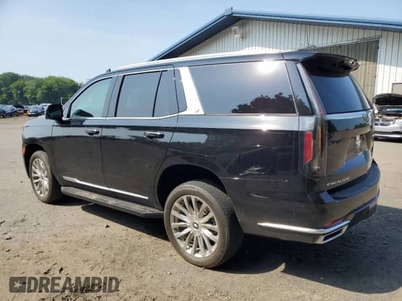 2023 Cadillac Escalade with VIN 1GYS4BKT9PR232158, listed as a Copart auction lot 57763355 with 49,500 mi miles and Salvage title. Bid and sale history available at DreamBid. Image 2.