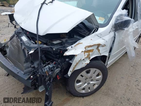 2017 Dodge Grand Caravan SE with VIN 2C4RDGBG2HR761788, listed as a IAAI auction lot 43441381 with 57,334 mi miles and . Bid and sale history available at DreamBid. Image 2.