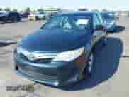 2013 Toyota Camry L with VIN 4T4BF1FKXDR293864, listed as a IAAI auction lot 43218850 with 102,492 mi miles and . Bid and sale history available at DreamBid. Image 2.