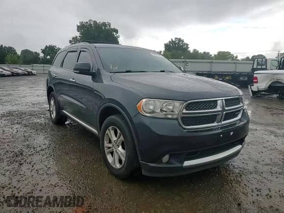 2013 Dodge Durango Crew with VIN 1C4RDJDG9DC682700, listed as a Copart auction lot 68078015 with 169,828 mi miles and Salvage title. Bid and sale history available at DreamBid. Image 14.
