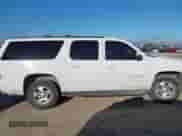 2011 Chevrolet Suburban LT z VIN 1GNSCJE05BR388248, wystawiony jako IAAI lot #42617677 z przebiegiem 247 514 mil mil oraz . Historia ofert i sprzedaży dostępna na DreamBid. Obrazek 13.