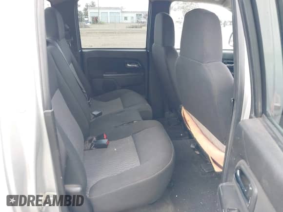 2010 Chevrolet Colorado 1LT z VIN 1GCJTCDEXA8114061, wystawiony jako IAAI lot #42235820 z przebiegiem 218 972 mil mil oraz . Historia ofert i sprzedaży dostępna na DreamBid. Obrazek 8.