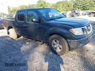 2011 Nissan Frontier Pro-4X with VIN 1N6AD0EV4BC420677, listed as a IAAI auction lot 43050825 with 142,954 mi miles and . Bid and sale history available at DreamBid. Image 1.
