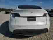 2022 Tesla Model Y Long Range с VIN 7SAYGDEE4NF339544, выставлен на аукционе Copart как лот 84565635 с пробегом 54 231 миль миль и Списание • Salvage title. История ставок и продаж доступна на DreamBid. Изображение 6.