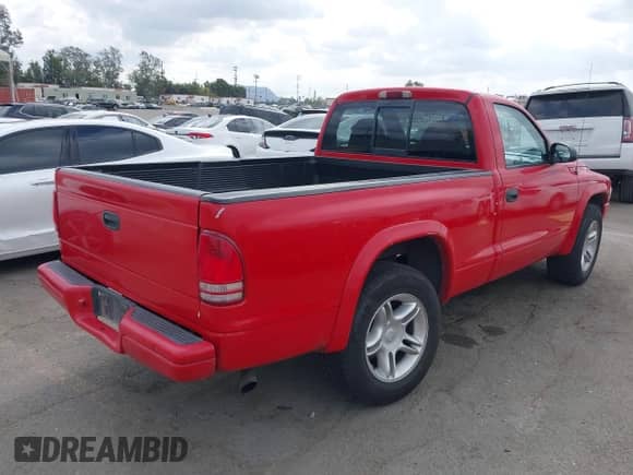 1999 Dodge Dakota SLT with VIN 1B7GL26Z5XS217114, listed as a IAAI auction lot 43418147 with 145,280 mi miles and . Bid and sale history available at DreamBid. Image 4.